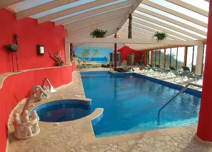 Geraeumiges Mit Kaminofen Und Terrasse By Interhome